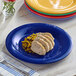 An Acopa Foundations melamine plate with a variety of sliced meats on it, including turkey.
