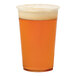 A Tossware Natural plant-based plastic cold cup filled with beer on a white background.