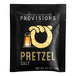 A black packet of Eastern Standard Provisions pretzel salt with a logo and text.