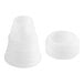 A white plastic cap and a white plastic cone with a cap.