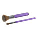 A close-up of two purple Wilton decorating brushes with silver handles.