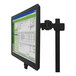 A Newcastle Systems monitor holder with a monitor mounted on it.