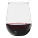 A Tossware Reserve stemless plastic wine glass filled with red wine.