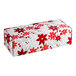 A white rectangular candy box with red poinsettias.