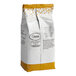A white bag of Nescafe Classico Ground Coffee with gold and black text.