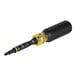 A close-up of a black and yellow Klein Tools 11-in-1 multi-bit screwdriver with a yellow tip.