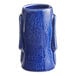 An Acopa blue ceramic shot glass with a handle.