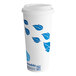 A white EcoChoice paper hot cup with blue leaves on it.