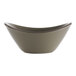 An International Tableware stoneware oval soup bowl with a speckled green and gray rim.