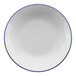 A white porcelain pasta bowl with a blue rim.