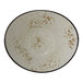 An International Tableware white stoneware oval fruit bowl with brown speckled spots.