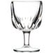 A clear Libbey schooner glass with a small base.