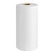 A case of Tork Handi-Size paper towels with a roll of paper towels.