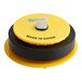 A yellow and black circular Cherne Gripper Plug with a label.