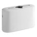 A white rectangular Tork countertop paper towel dispenser with a white cover.