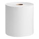 A roll of Tork white paper towels on a white background.