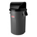 A black Suncast roto molded dome trash can lid on a black trash can.