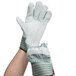 A pair of Cordova work gloves with green and white stripes.