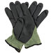 A pair of Cordova Power-Cor small cut-resistant gloves with black foam nitrile coating on the palms, with black and green fabric.
