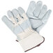 A pair of Cordova Tuf-Cor white canvas work gloves with heavy leather palm coating and rubber cuffs.