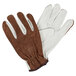 A pair of brown and white leather gloves.