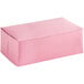 A pink Baker's Mark donut box with a white background.