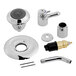 A group of chrome Delta shower faucets with accessories.