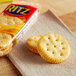 A package of Nabisco Ritz Cheese Sandwich Crackers on a towel.