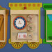 A Flash Furniture wooden wall activity board with three wooden train clocks.