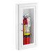 A Badger fire extinguisher in a white steel cabinet.