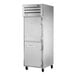 A white True Spec Series reach-in refrigerator with silver half doors.