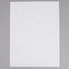 A white Baker's Lane parchment paper sheet on a gray surface.