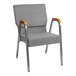 A gray Flash Furniture church chair with wood accent arms and a silver vein metal frame.