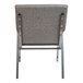 The back of a gray Flash Furniture church chair with metal accents.