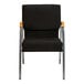 A black Flash Furniture church chair with silver vein frame and wood accents.