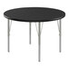 A black Correll round activity table with silver legs.