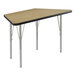 A trapezoid-shaped Correll activity table with silver legs.