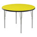 A yellow Correll activity table with silver legs and black trim.