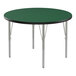A green Correll activity table with silver legs.