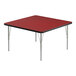 A red square table with a black edge and silver legs.