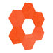A close-up of orange Luxor hexagon wall decorations.