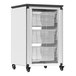 A black and white aluminum storage cabinet with whiteboard and pegboard on wheels with clear plastic bins inside.