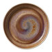 A white porcelain plate with brown and purple swirls.