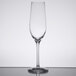 A close-up of a Stolzle clear wine flute glass.