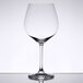 A close-up of a clear Stolzle Burgundy wine glass.