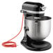 A black and silver KitchenAid bowl lift countertop mixer with standard accessories.