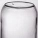 A close up of a Libbey clear glass Mason jar with a lid.