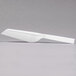 A white plastic utility scoop with a handle.