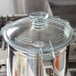 A clear glass lid on a Robot Coupe commercial food processor bowl.