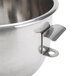 A silver stainless steel mixing bowl with a metal handle.